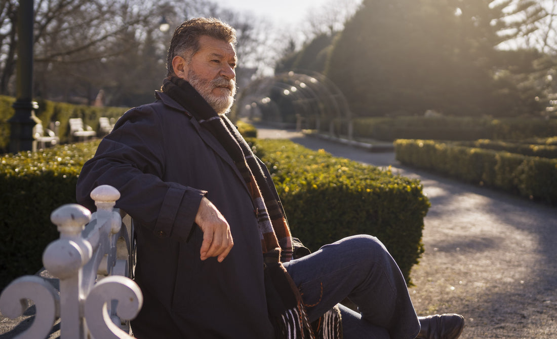 side-view-elderly-man-sitting-bench
